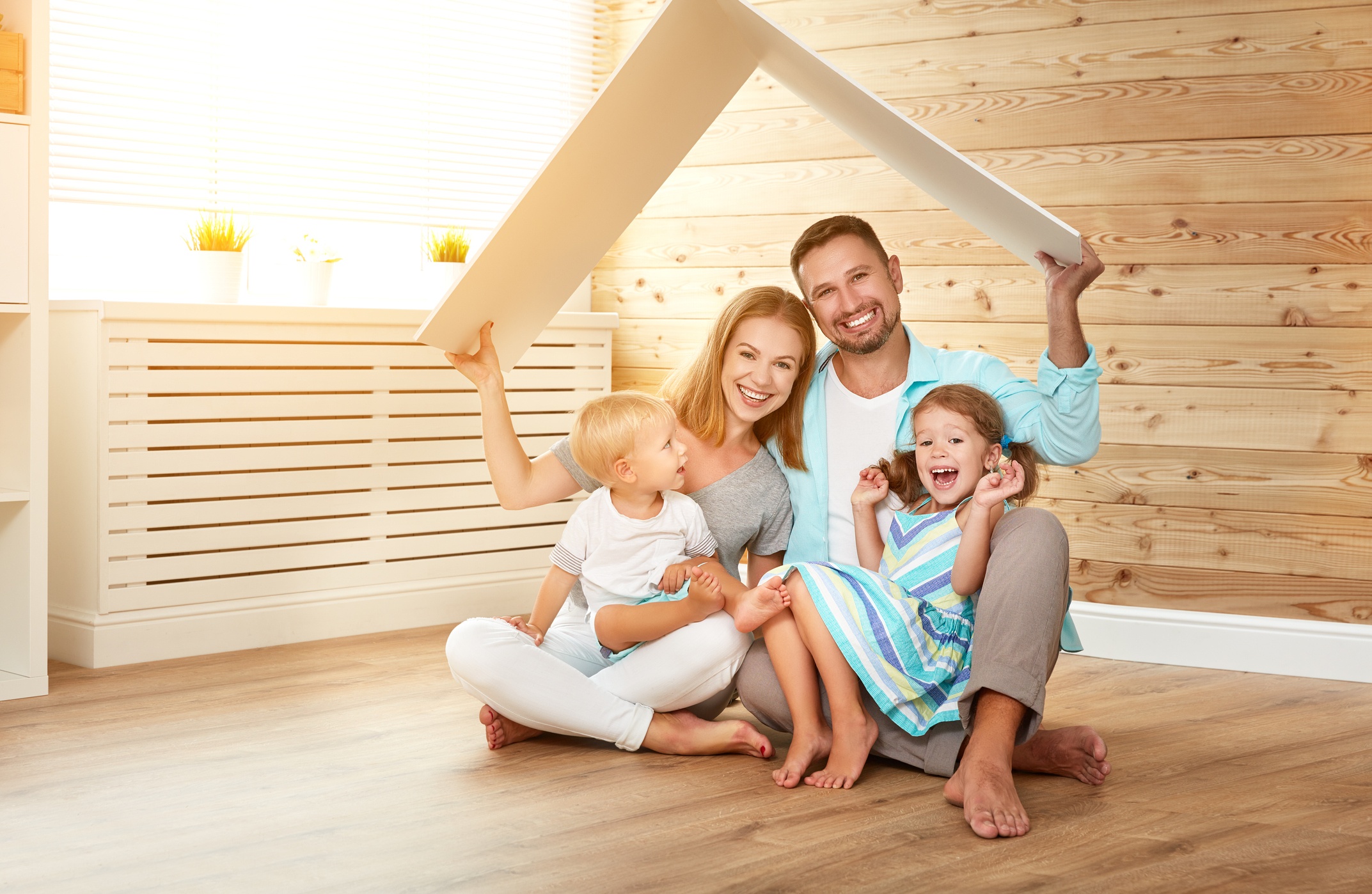 cept housing a young family. mother father and children in new home